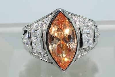 11.33CT ORANGE TOPAZ & CUBIC ZIRCONIUM RING