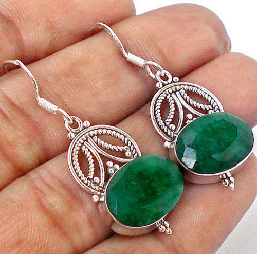 **R2 400** MYSTERIOUS EMERALD 925 STERLING SILVER EARRINGS
