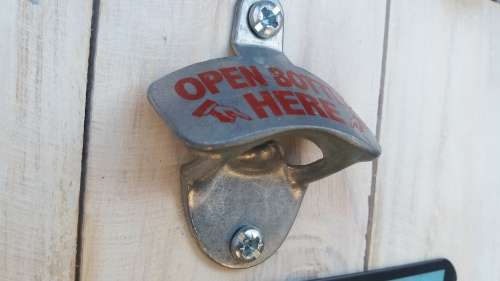 Old fashion wall mount bottle opener