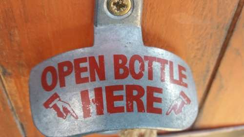Old fashion wall mount bottle opener