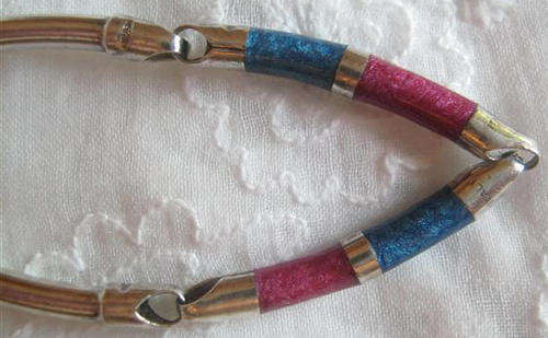 INTERESTING AND UNUSUAL, ITALIAN SILVER 925, BRACELET WITH ENAMEL SECTIONS IN PINK AND BLUE.