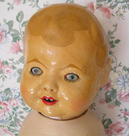 THIS PRETTY FRESH FACED, LARGE, BABY DOLL HAS QUITE A STORY TO TELL