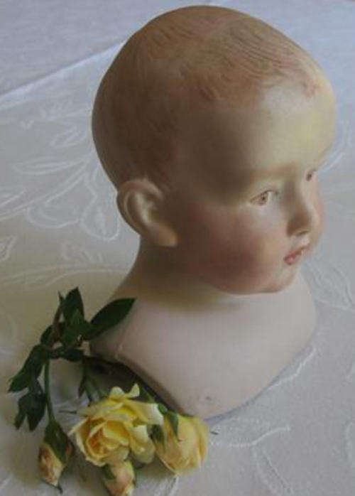 REPRODUCTION ??  OF AN ANTIQUE HEUBACH, GERMANY PORCELAIN DOLLS HEAD.