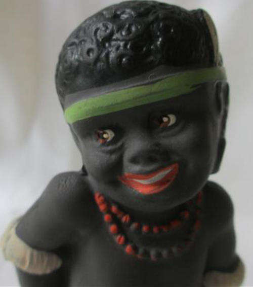 VINTAGE DOLL,  YOUNG BLACK CHILD IN TRADITIONAL DRESS, RUBBER SQUEEK TOY