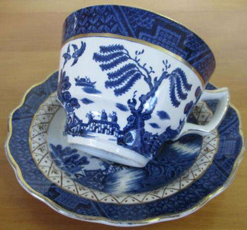 VINTAGE, BOOTHS REAL OLD WILLOW BLUE AND WHITE BREAKFAST CUP AND SAUCER HANDPAINTED GOLD DETAIL