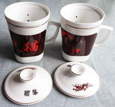 INTERESTING....MATCHING PAIR OF CHINESE HERBAL PORCELAIN MUGS WITH INFUSER AND LID