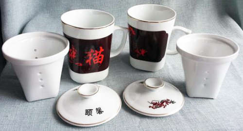 INTERESTING....MATCHING PAIR OF CHINESE HERBAL PORCELAIN MUGS WITH INFUSER AND LID