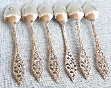 SET OF 6 x MATCHING SILVER TONE TEA SPOONS WITH PRETTY HANDLES.,