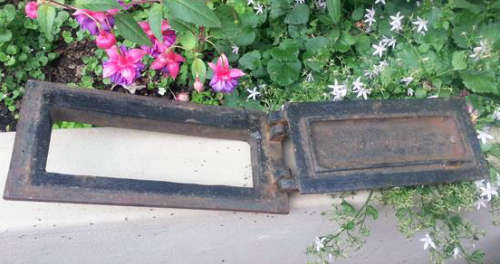 ANTIQUE, CAST IRON OVEN DOOR AND SURROUND  FROM A WOOD BURNING STOVE, DEER DESIGN...UNUSUAL !!!!