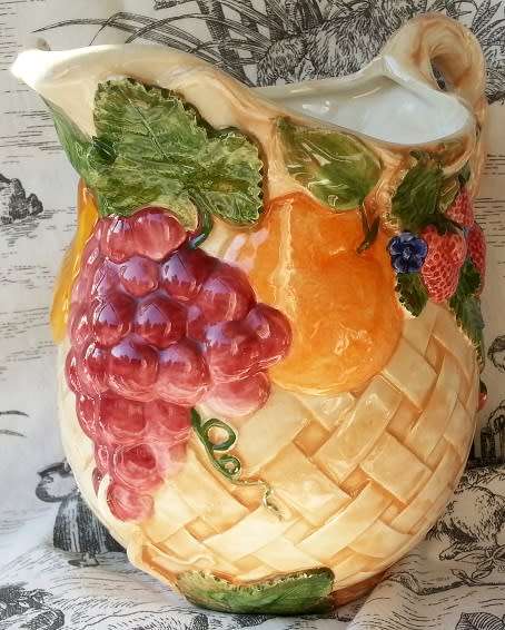 LARGE VINTAGE CERAMIC JUG, BRIGHT AND CHEERFUL COLOURS DECORATED WITH EMBOSSED FRUIT