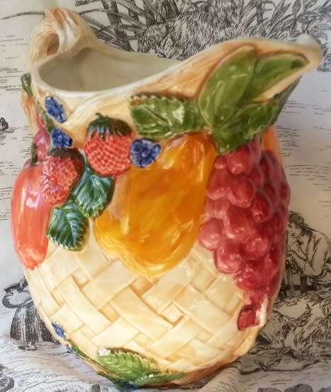 LARGE VINTAGE CERAMIC JUG, BRIGHT AND CHEERFUL COLOURS DECORATED WITH EMBOSSED FRUIT