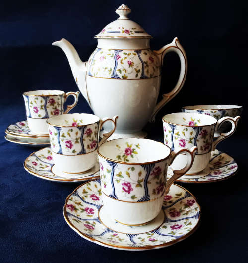 COAL PORT BONE CHINA, PARTIAL DEMITASSE SET IN THE TRELIS ROSE DESIGN