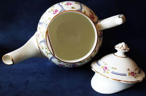 COAL PORT BONE CHINA, PARTIAL DEMITASSE SET IN THE TRELIS ROSE DESIGN