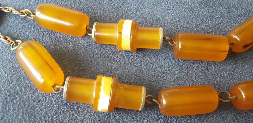 VINTAGE, HONEY COLOURED, BAKELITE   NECKLACE, OVAL  BEADS AND UNUSUAL TUBE LIKE BEADS