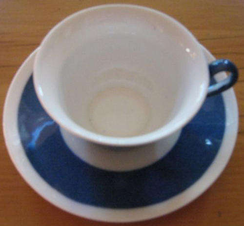 R1.00    ANTIQUE WEDGEWOOD, FINE PORCELAIN, CUP AND SAUCER, WHITE WITH DARK BLUE BAND.