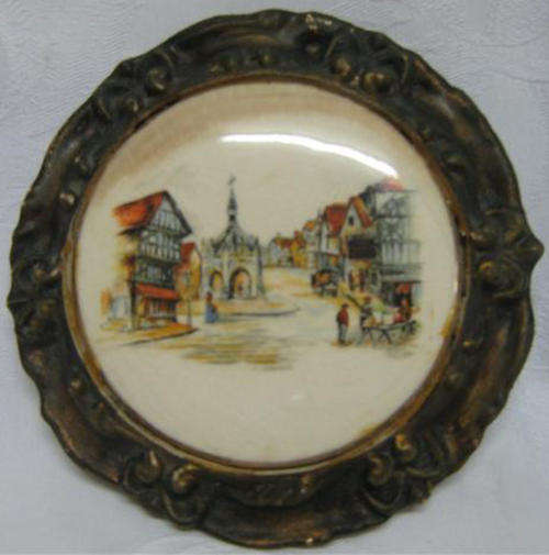 HANDPAINTED, ANTIQUE POT LID WITHIN AN ORNATE FRAME.FRANK COOPER, OXFORD ENGLAND.