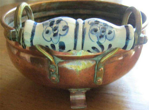 ANTIQUE COPPER FRUIT BOWL, HANDPAINTED  DELFT PORCELAIN HANDLES.