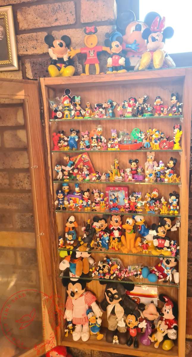 Large Lot Collection of Disney figurines, Does Not Include Display Cabinet