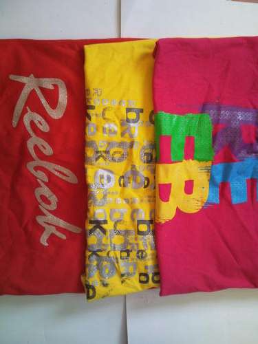 1ST ON BOB***WOMENS REEBOK TEES***2LRG AND 1MED ONLY.