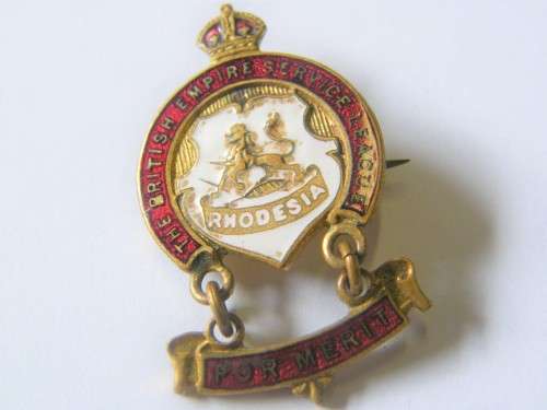 Rhodesian badge for merit to Mrs M. Rixon 1954