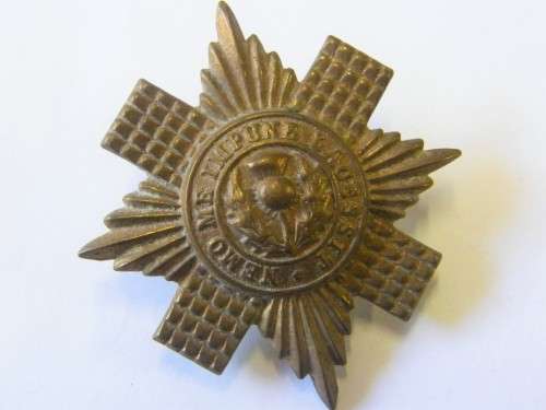 Great Britain Scots Guards cap badge - Lugs