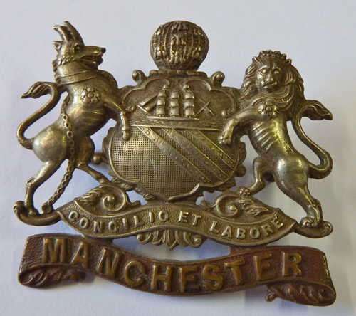 Great Britain Manchester Regiment cap badge - Lugs