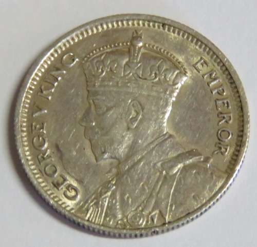 1936 Rhodesia Sixpence AU with scratch on George V`s head