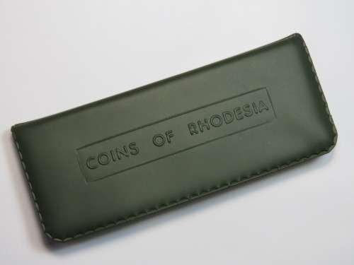 Coins of Rhodesia set in green holder