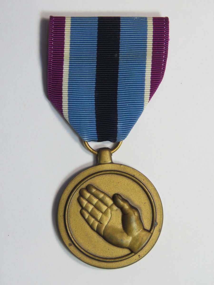 U.S.A. For Humanitarian service - in mint condition