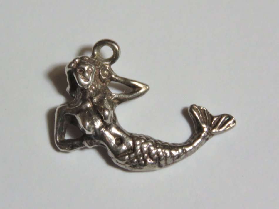 Silver charm mermaid pendant