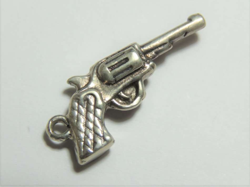 Silver revolver charm pendant