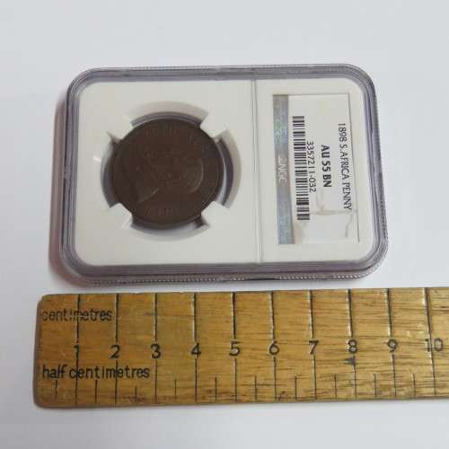 1898 ZAR Kruger penny graded AU 55 BN by NGC