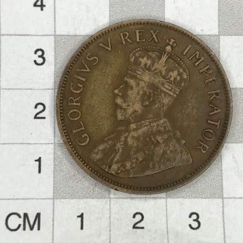 1934 Bronze Penny with 4 printed askew