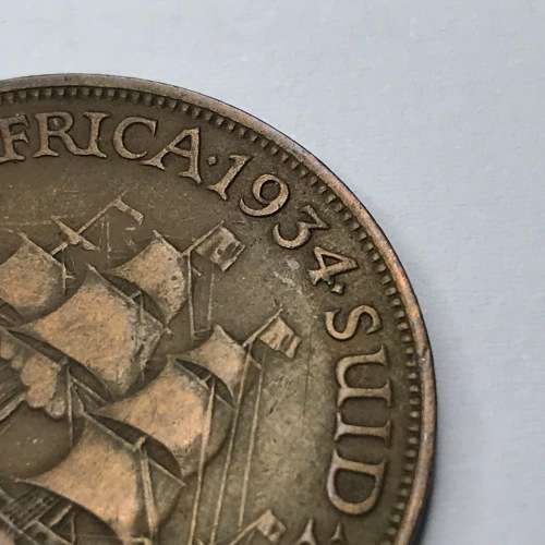 1934 Bronze Penny with 4 printed askew