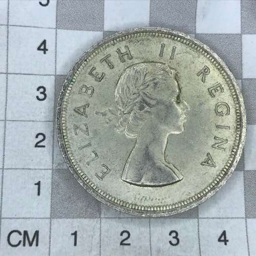 1958 SA Union Crown with die crack from tail of Springbok through 1st A of Africa