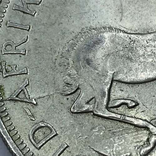 1958 SA Union Crown with die crack from tail of Springbok through 1st A of Africa