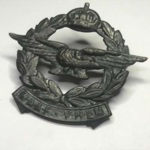 SA Air Force Blackened Brass Cap Badge - In very good condition