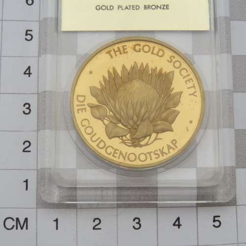 The Gold Society gold plated bronze medallion - Sealed