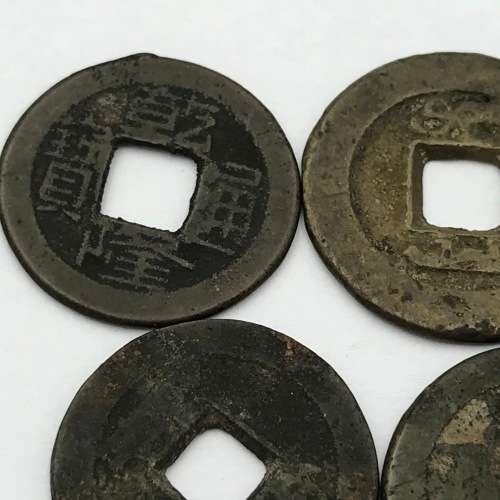 Lot of 4 Chinese cash tokens