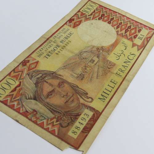 French Afars and Issas 1000 Francs banknote - B1 corner tear