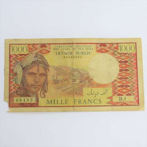 French Afars and Issas 1000 Francs banknote - B1 corner tear