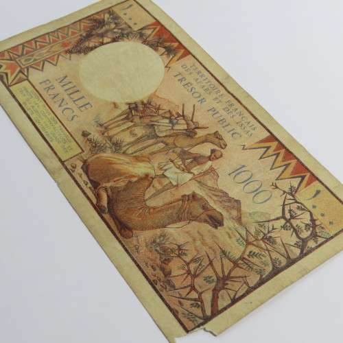 French Afars and Issas 1000 Francs banknote - B1 corner tear