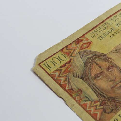 French Afars and Issas 1000 Francs banknote C1 corner tear