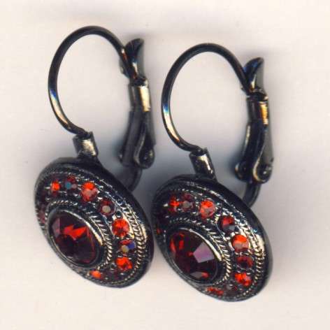 Earrings with nice red stones as per scan