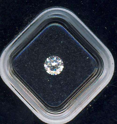 De Beers millinium Diamonds on card - about 0.10 Ct