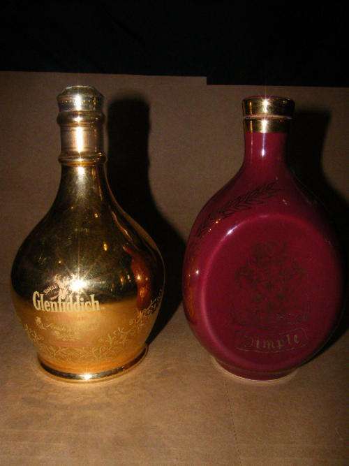 2 Large porcelain advertising bottles - Glenfiddich ( still sealed, but evaporated ), Dimple (empty)