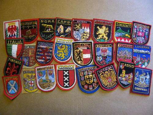 Lot of 24 Vintage European city and country cloth badges collected during a 1970 European tour