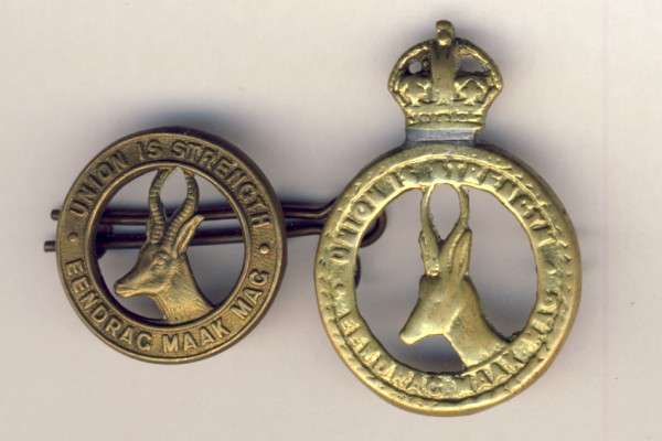 Lot of 2 Union is strength badges - one with kings crown as per scan