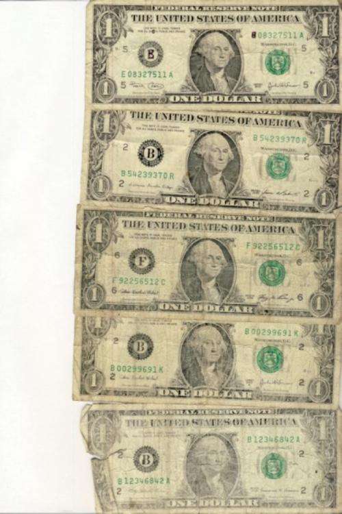 Lot of 8 US Dollars well used, and one silver certificate - as per scan