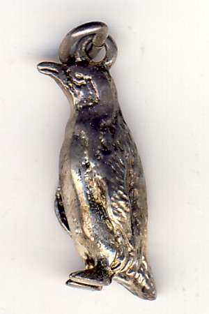 Silver penguin pendant as per scan